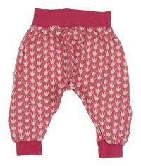 Růžovo-bílé vzorované lehké tepláky s korunkami 