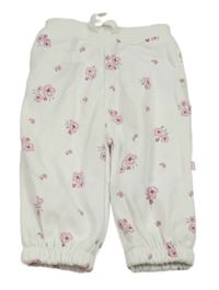 Bílé tepláky s kytičkami St. Bernard