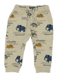 Béžové tepláky s pravěkými zvířaty C&A