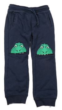 Tmavomodré tepláky s dinosaury C&A