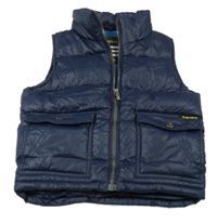 Tmavomodrá šusťáková zateplená vesta s kapsami 