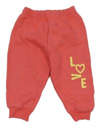 Korálové tepláky s nápisem 