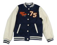 Tmavomodro-smetanová fleecovo/koženková lehce zateplená bunda s číslem Zeeman