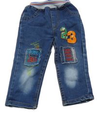 Modré rifle s nášivkami a úpletovým pasem