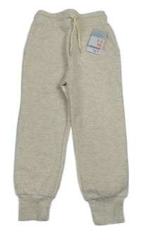 Nové - světlebéžové melírované vzorované tepláky PRIMARK