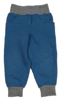 Modré tepláky s pruhovaným pasem 