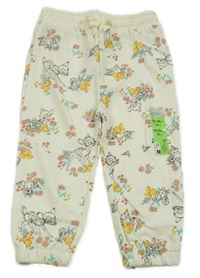 Nové - smetanové tepláky s květinami a Bambim Primark