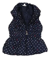 Tmavomodrá šusťáková zateplená vesta s puntíky zn. Fagottino