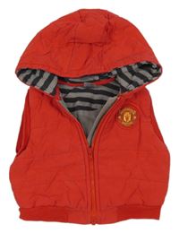 Červená šusťáková fotbalová zateplená vesta s kapucí Manchester United 