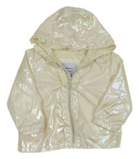 Smetanová třpytivá šusťáková jarní bunda s volánky a kapucí