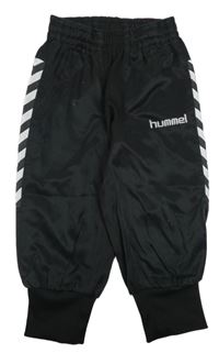 Černo-bílé sportovní crop tepláky Hummel