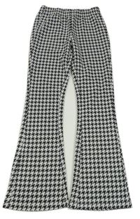 Černo-bílé vzorované teplákové zvonové kalhoty Y.F.K. 