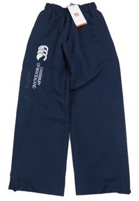 Nové - tmavomodré podšité šusťákové kalhoty s logem Canterbury