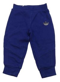 Tmavomodré tepláky s logem Adidas