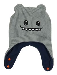 Světlemodrá čepice s příšerkou Decathlon