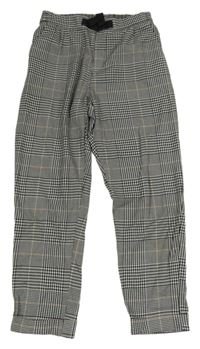 Černo-bílé kostkované volné kalhoty H&M