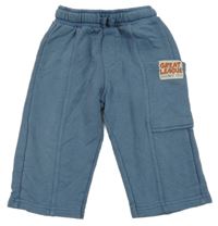 Modrošedé tepláky s kapsou s nášivkou Zara