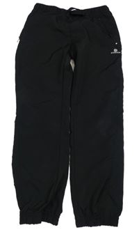 Černé šusťákové funkční kalhoty s logem Domyos