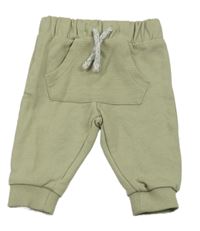 Béžové tepláky s kapsou C&A