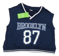 Nové - Tmavomodrá mikinová crop vesta s číslem Page One Young 