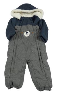 Tmavošedo/tmavomodrá melírovaná prošívaná zimní kombinéza s medvídkem a kapucí C&A