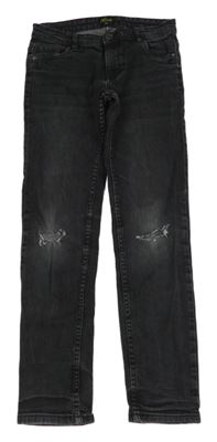 Černé skinny rifle s děravými koleny alive