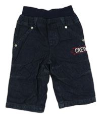 Tmavomodré rifle s úpletový pasem a nápisem