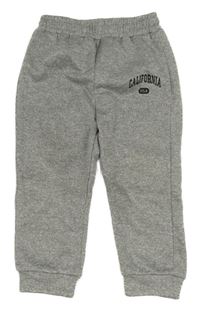 Šedé melírované sportovní kalhoty s nápisem