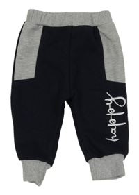 Tmavomodro-šedé tepláky s nápisem 