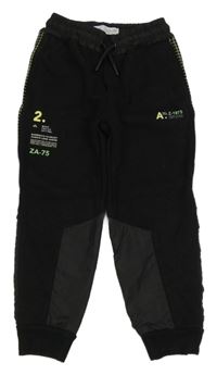 Černé tepláky s nápisy a šusťákovými prvky Zara