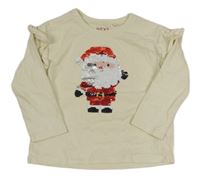 Krémové triko se Santou z překlápěcích flitrů a volánky Next