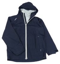 Tmavomodrá šusťáková funkční jarní bunda s kapucí TRIBORD