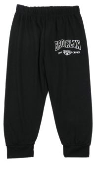 Černé tepláky s nápisem 