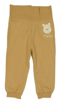 Okrové tepláky s Pú Disney