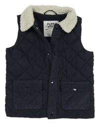 Tmavomodrá šusťáková prošívaná zateplená vesta 