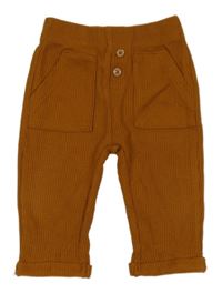 Hnědé žebrované tepláky s kapsami 