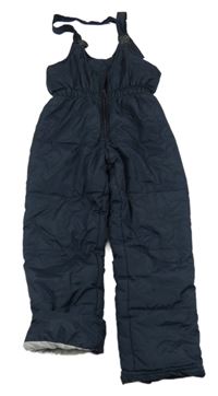 Tmavomodré šusťákové laclové kalhoty