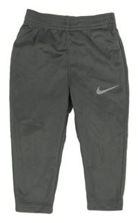 Tmavošedé sportovní tepláky s logem Nike