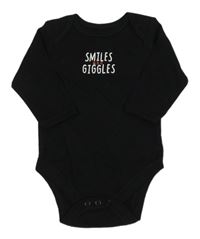 Černé body s nápisem Primark