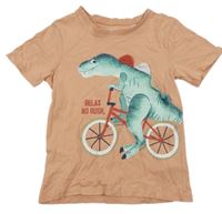 Světleoranžové tričko s dinosaurem na kole C&A