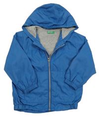 Modrá šusťáková jarní bunda s kapucí Benetton