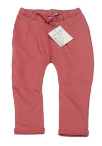 Nové - růžové tepláky Prénatal