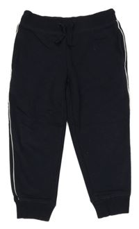 Tmavomodré tepláky s pruhem Topolino