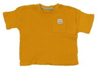 Oranžové úpletové tričko s kapsou C&A