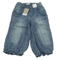 Nové - modré capri rifle s volánky Next