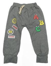 Šedé lehké turecké tepláky s obrázky 