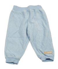 Světlemodré sametové tepláky s nášivkou