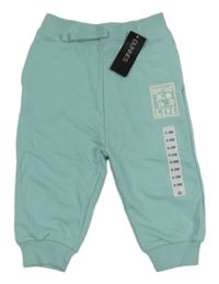 Nové - Mátové tepláky s potiskem Dunnes