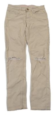 Béžové skinny fit rifle s dírami na kolenkou 