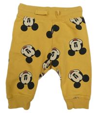 Žluté tepláky s Mickey Mousem H&M